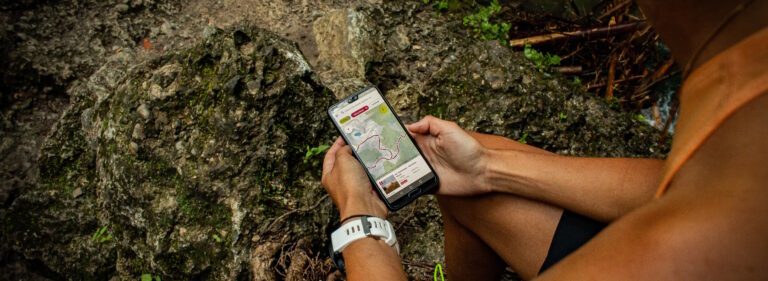 Image showing someone holding a mobile phone planning a walking route